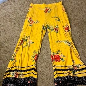 Golden yellow floral loose pants with slit up the front